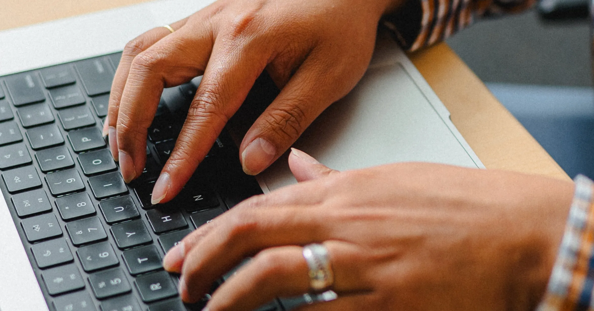 IT professional working at a laptop, evaluating Microsoft Copilot deployment for their organization